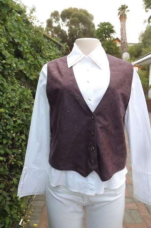 Burgandy colour ladies brushed polyester waistcoat by Monopoly clothing.Size 38/14.Halfmoon designed