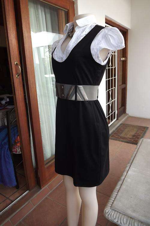 Black polyester/rayon stretch dress with white striped cotton inner blouse by Kelso size 36/12.