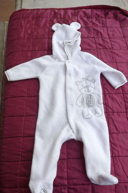 White baby grow for 0-3 months old baby.Eared hood.Fred the bear on front.Used condition