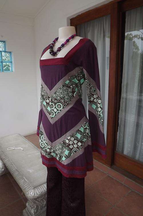 Amazing long top/dress size 34/10 originally designed.Purple and green colours with square neckline