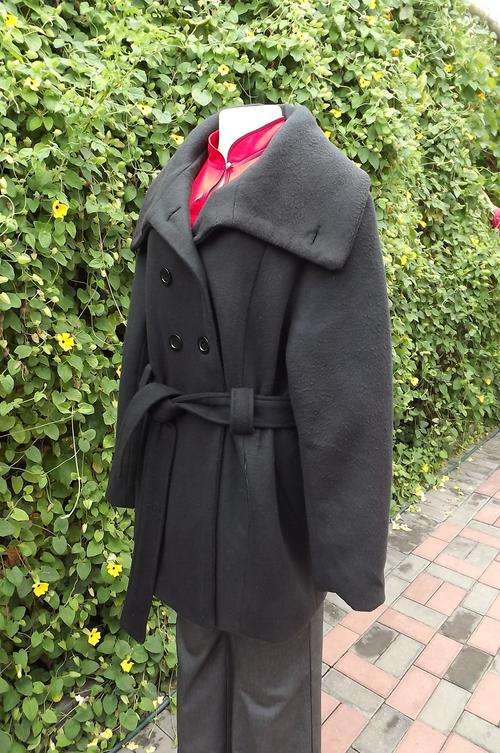 Long black brushed polyester double breasted jacket with fabric tie belt.Size 44 by Image.Wide colla
