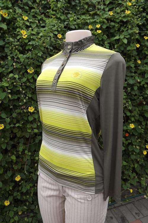 Very pretty KJ Golf and Sports polyester stretch long sleeve top size 34/10.Unique high elasticated