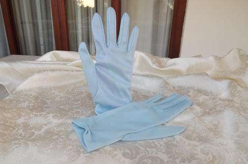 Pair of baby blue Perlon size 7.5 gloves by Kayser.Pretty bow on seam.Good condition