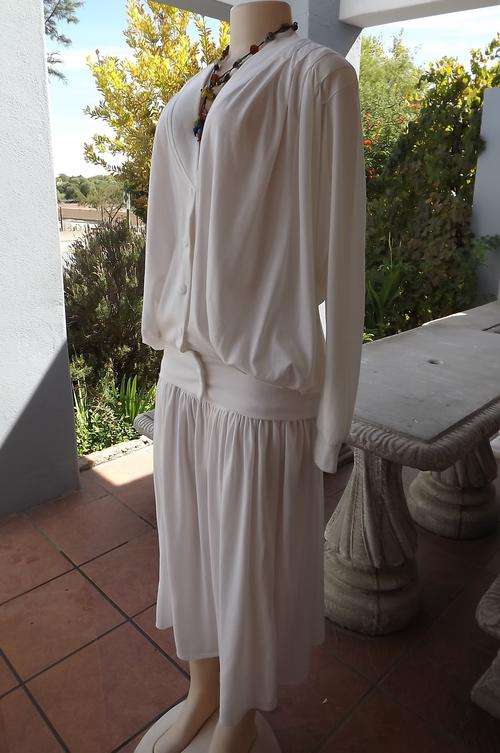 Stunning 2 piece off white skirt suit in size Medium 34-36 by Identikit.Yoked gathered skirt.Hips 95