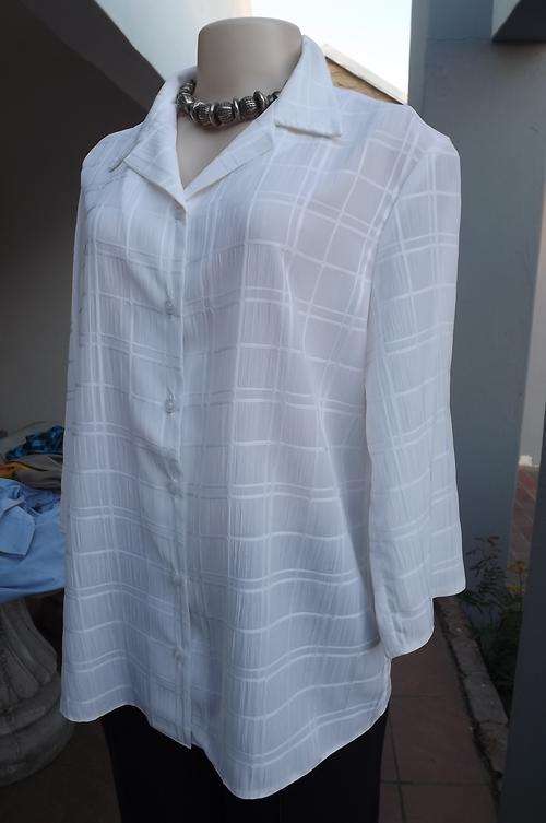 White sheer polyester blouse by Judy's Pride in size 40/16.Checked design on fabric.Button down with