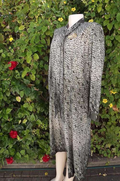 Olive green patterned "Something New"Tej winters dress size 42/18.Bordered seamline.Banded collar wi