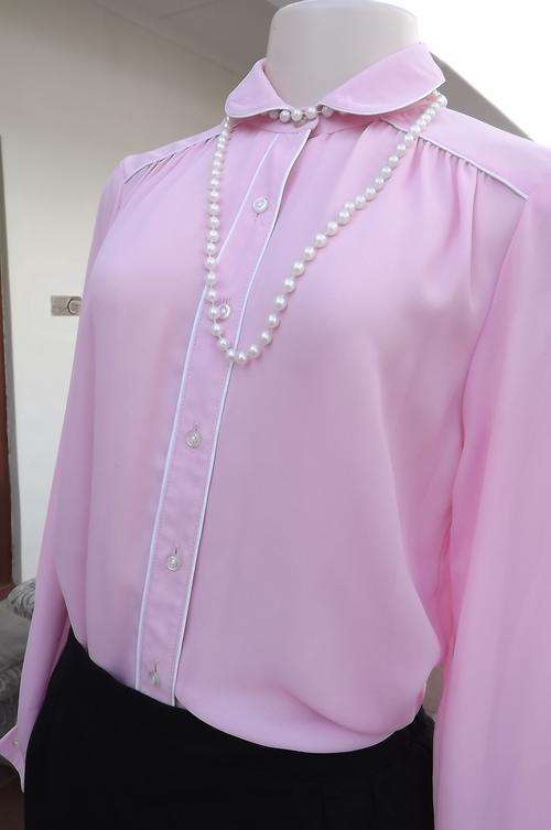 Pretty in pink!Fabulous coronation pink blouse in size 34/10.Gathered yoked shoulders.White edging o