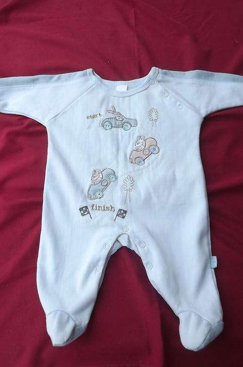 Pretty light blue babygrow with extra warm inner for 3 - 6 kg.65% Poly 35% cotton.Good condition