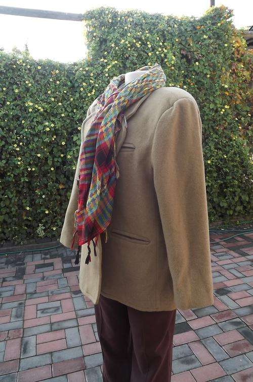 Camel jacket in 70% wool 30% polyester.Size 42/18 by Rudco.Two front slited pockets.Fully lined.