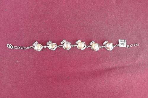 Beautiful rodium plated bracelet with caramel colour freshwater pearls