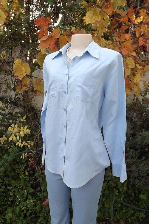 Extra good quality 100% cotton light blue shirt by Woolworths in size 36/12.Two front pockets.Shirt