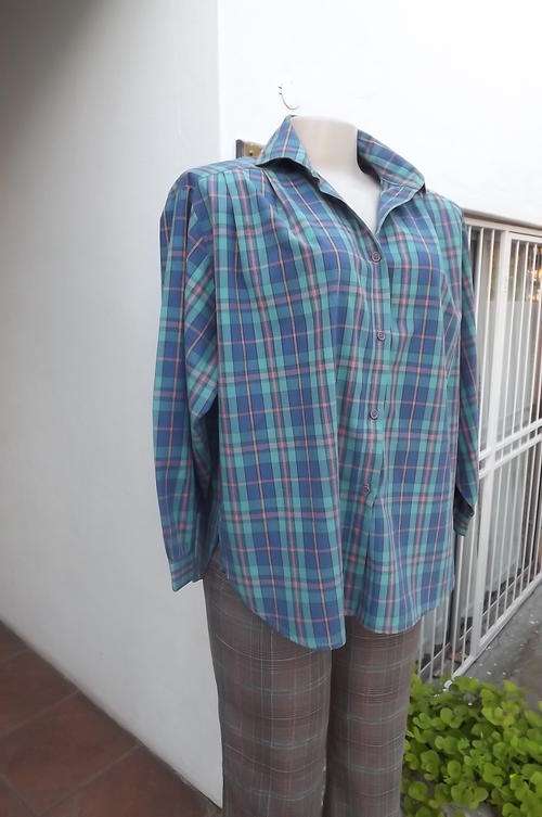 Perfect match for your jeans.Shirt in blues and pink check pattern.Size 38/14.Wide cut sleeves.