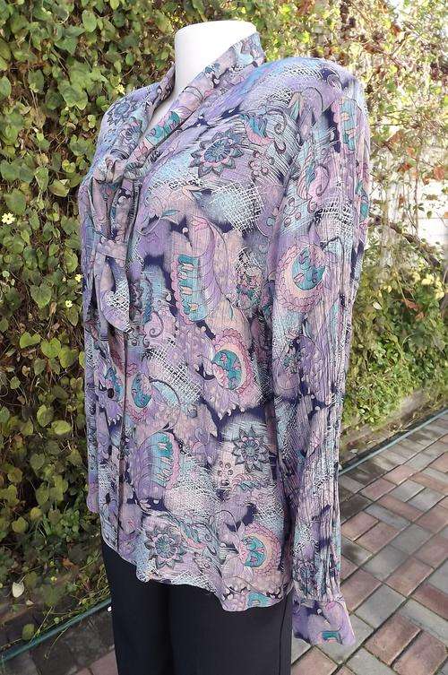 Very pretty long sleeve blouse size 42/18 by Matson in a medley of purple and blue.Creased fabric in