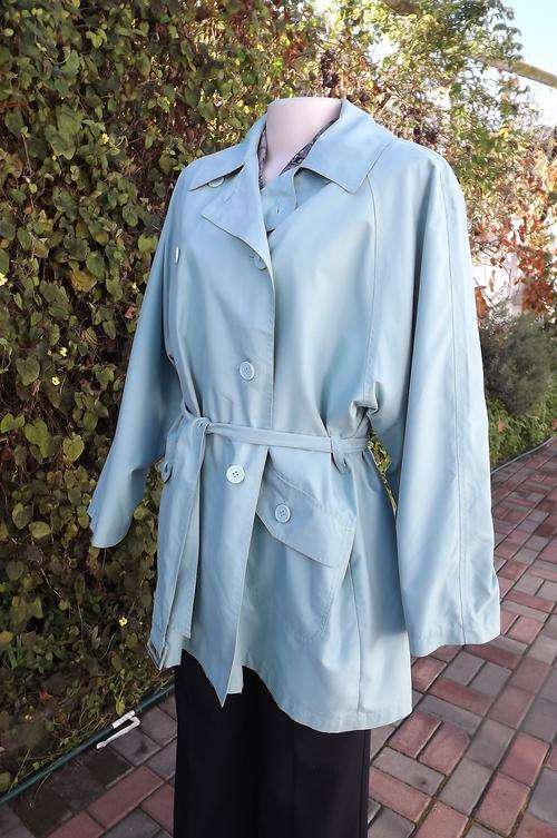 Beautiful light turquoise ladies over coat size 44-46 by Smith&CO.In 100%polyester.Double breasted.