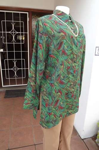 Fabulous MSD design blouse in colourful print size 44/20.Long with slitted sides.Colours of green,bl