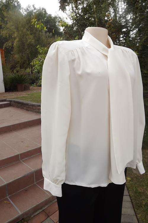 Charming cream silky polyester blouse by Karisma size 38/14 with ascot collar.Good condition.Gathere