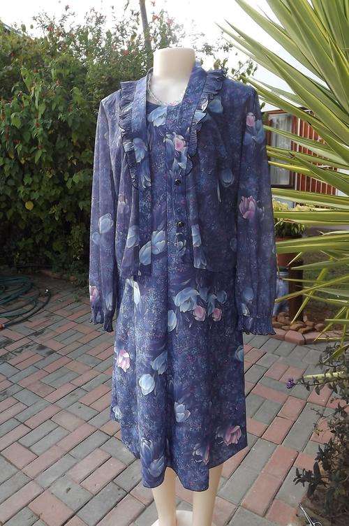 Princess style blue&purple floral dress with jacket by Ramelle size 38/14.Dress in polyester.Jacket