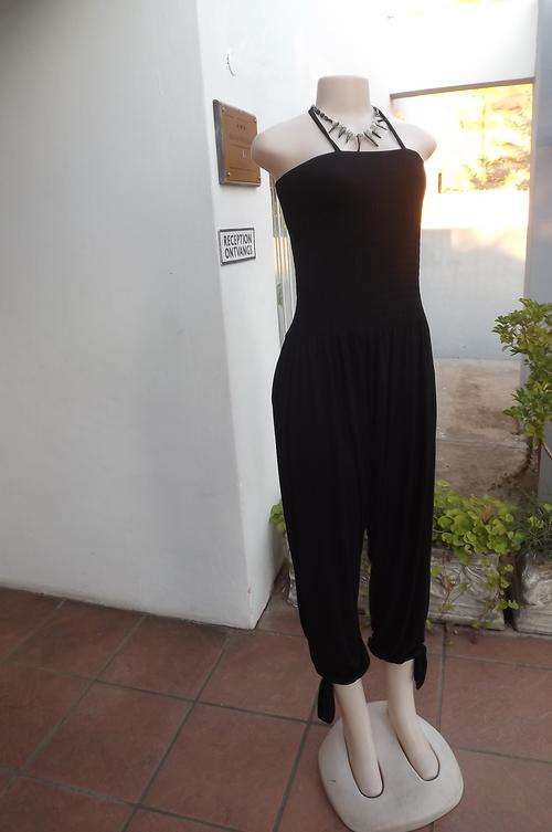 Sexy black stretch cotton shoulderless jumpsuit with harem pants size 38/14.Elasticated top.Legs fas