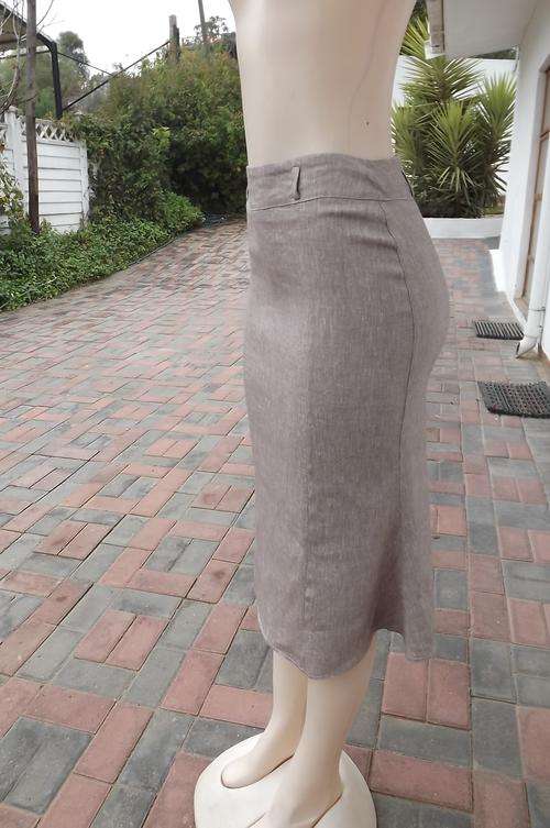 Knee Length Light Taupe pencil Skirt with trumpet style seam. Size 32/8 . In stretch polycotton.