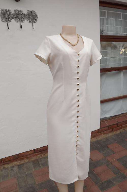 Fabulous cream button down short sleeve ankle length sheath dress by Woolworths size 36/12.Viscose/P
