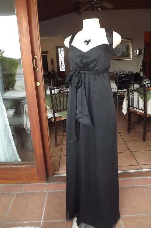 Black evening dress in size 36/12.Boutique made.Gathering under bustline.Long strap on front