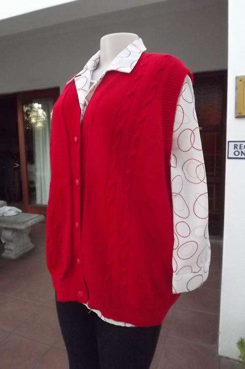 Red hand knitted ladies sleeveless cardigan with cabled front.Size 42/18.Button down front.Good cond