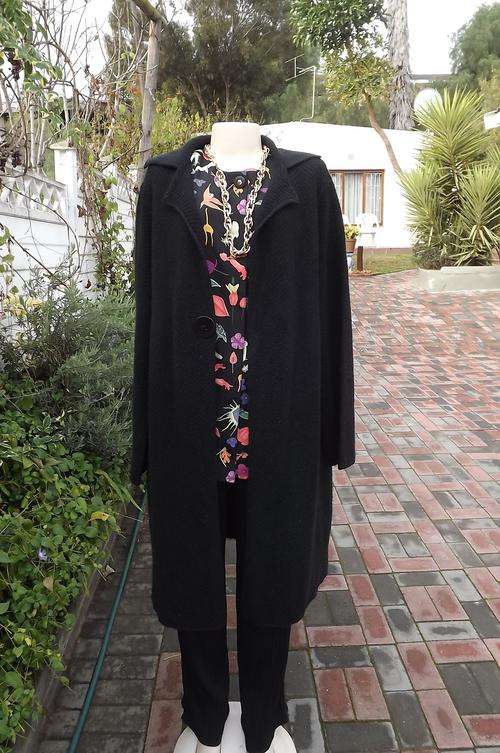 Black knitted open hanging loose coat by Woolworths in XL size 46/22.In good condition