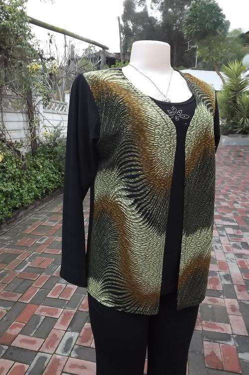 Amazing black stretch polyester long sleeve top with overlay waistcoat size 38/14.Rounded neckline.