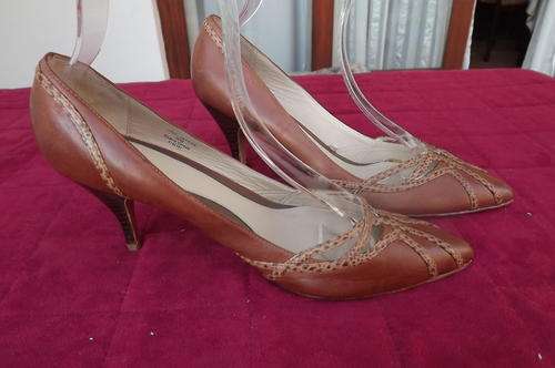 Pair of tan high heel leather shoes from Woolworths made in Vietnam size 7.Used but in very good con