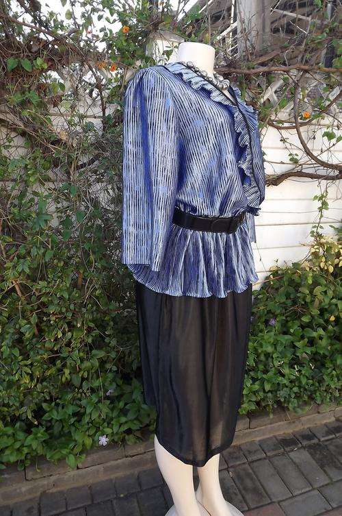 Vintage blue&black dress from Foshini size 44/20.Permanent pleated.Frill around neckline