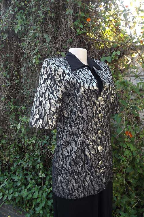 Smart black with silver pattern tailored evening jacket by Helenel in size 32/8.Beautiful neckliine