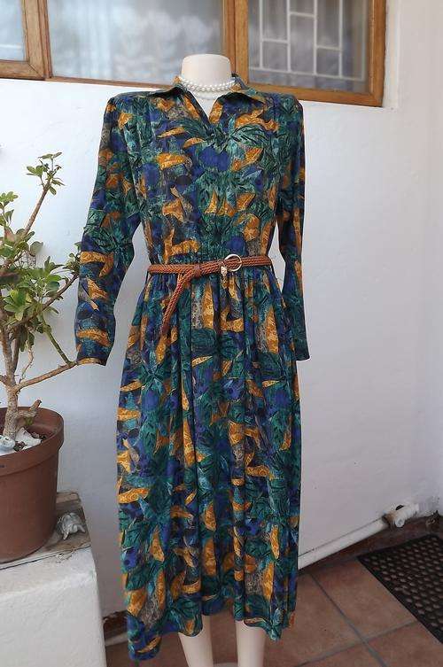 Turquoise,blue and mustard patterned 100% viscose dress size 34/10 by Truworths.Top button down