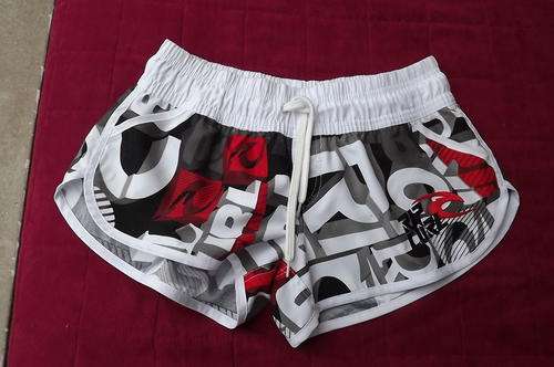 Ripcurl mini short in 100% polyester with elasticated middle & drawstring.Size 32/8.New condition