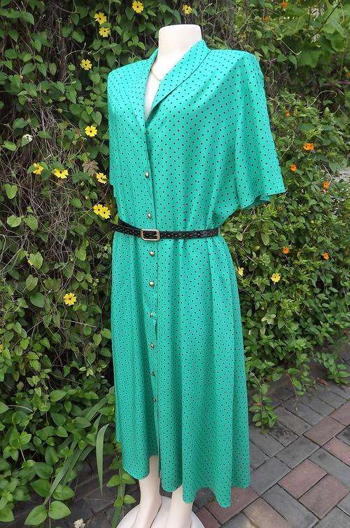 Forest Green Woolworths dress with black polka dots size 44/20.Button down front.Viscose front.