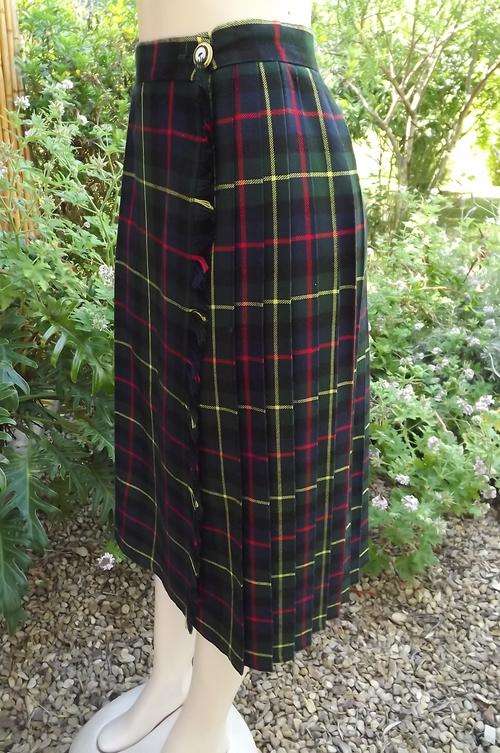 Tartan check fold over "TruVal"polyester blend winter skirt.Size 34/10.Knife pleated with flat front