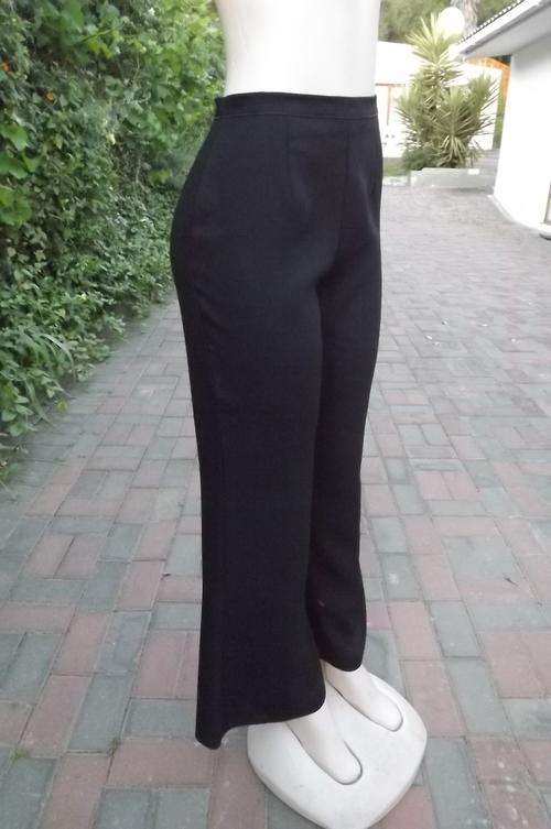 Black high waisted classic 100% polyester wash&wear.Size 36/12.Bell bottoms.Zip at back.No stretch!