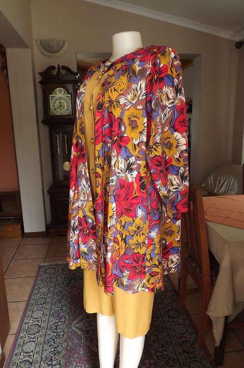 Eyecatching mustard colour button dress with attached floral jacket size 34/10.Viscose/cotton blend.