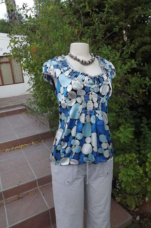 Black satin like top with blue and grey dots. By International concepts. size 32/8. New condition