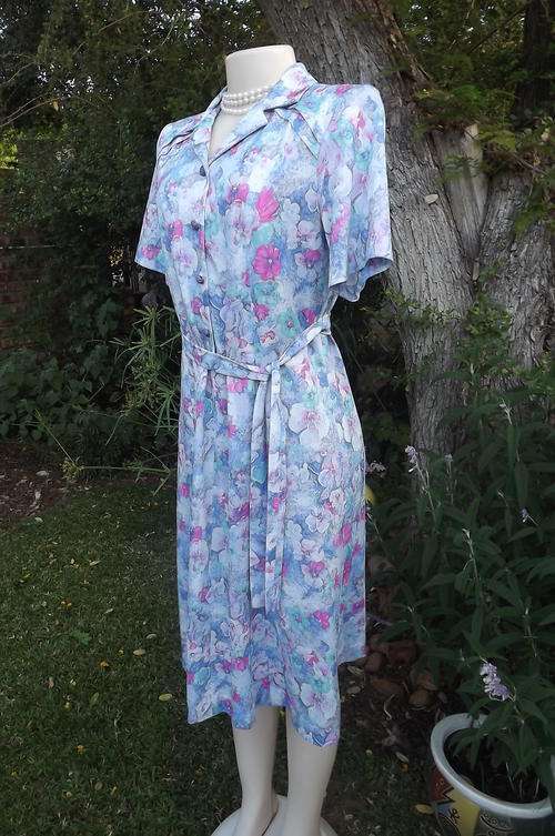 Stunning tastefully printed blue & pink floral princess style. Nuvele by Rosecraft dress. Size 38/14