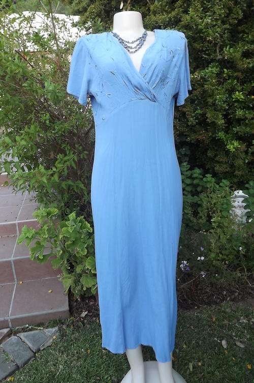 Sky blue creased polyester maxi dress in size 36/12 by Woolworths. Used but in good condition