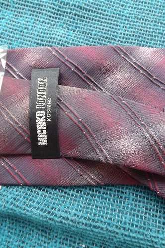 Handsome textured maroon/navy stripe patterned necktie by Michiko London. New item.