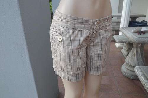 Beige and brown check short.By Legit in size 34\10.Unique side pockets and dummies at back.
