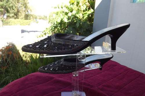 Pair of black kitten heel open heel sequined shoes in size 6 by Woolworths.Used but good condition..