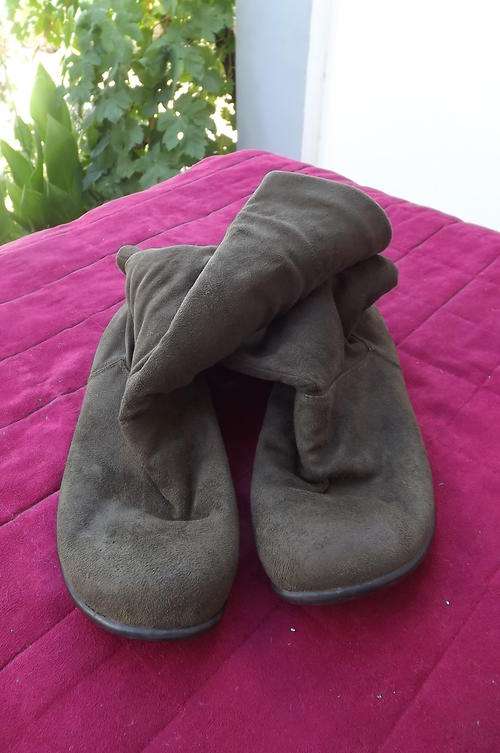 Pair of dark olive green soft polyester boots in size 7 by Staccato. Used but in good condition.