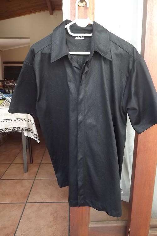 Beautiful black textured URB collection short sleeve men's shirt size L.New condition.