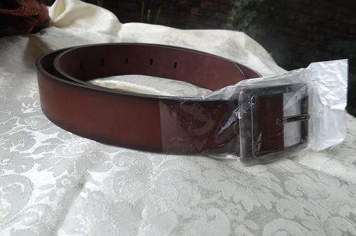 Genuine leather belt in tan brown colour with darker brown edges.Length 105cm/42 .