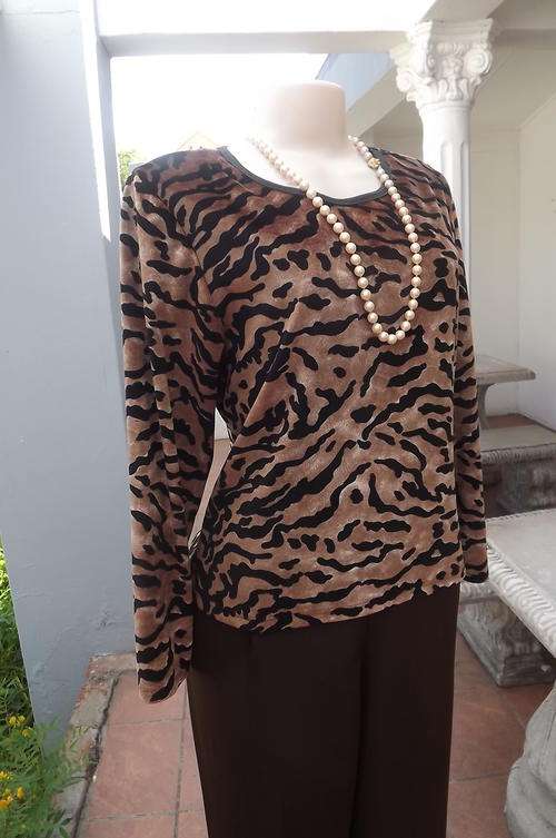 Soft lux velour animal print long sleeve top.Size 38/14.By Lovejoy. Very good condition.