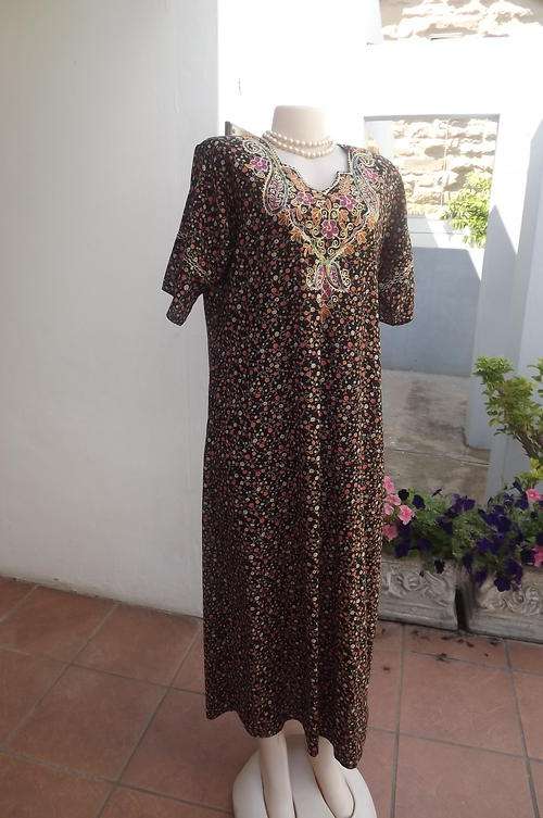 Black maxi loose hanging dress with tiny floral pattern.Size 40/16 Sampeera Fashions India.