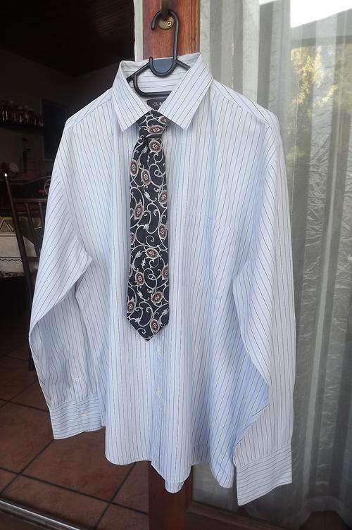 Light Blue men's long sleeve shirt with darker  blue stripe by Cu + Co.1933 in size Large.With tie.