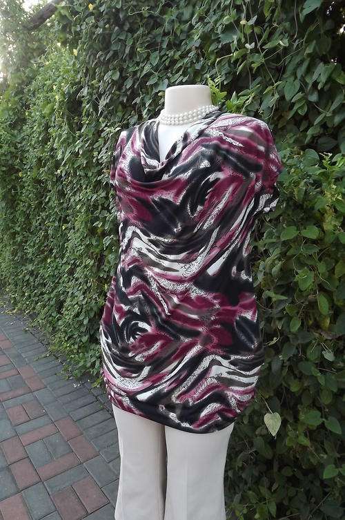 Beautiful long soft stretch polyester top with cowl neckline. Size 36/12.